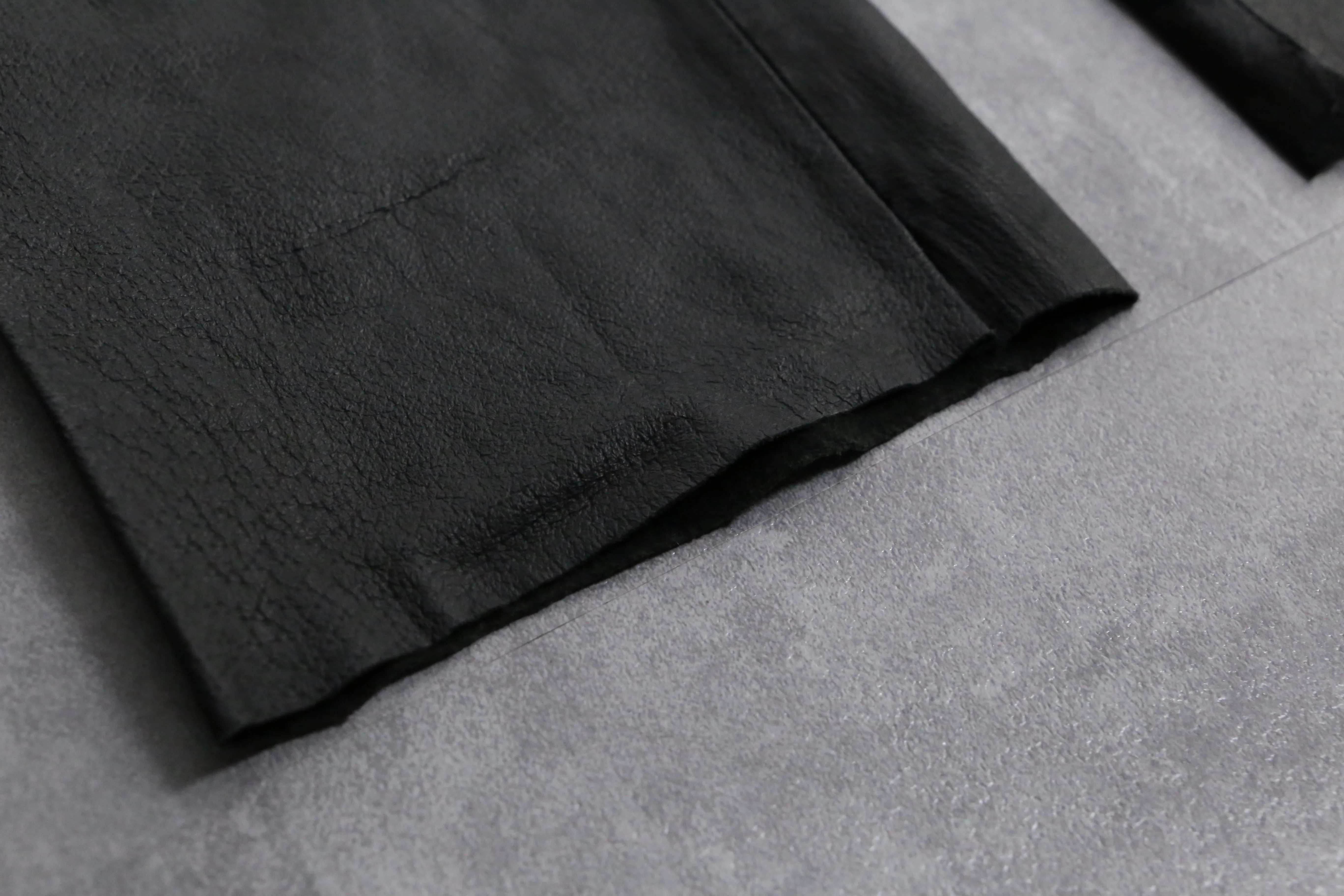 black fake leather pants